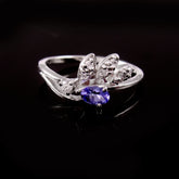 Solid 18K White Gold Natural Tanzanite Tiara Crown Ring | Oval Violet-Blue Gemstone Band with Marquise Leaf Diamond Accents | Fine December Birthstone Gift